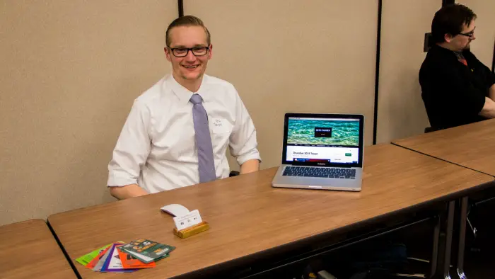 Image of student showcasing their mixed media on a laptop.