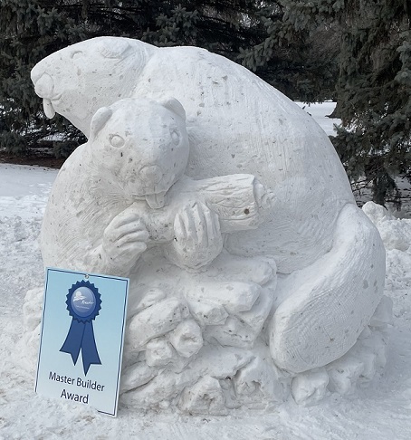 Picture of a carved bear in a hammock