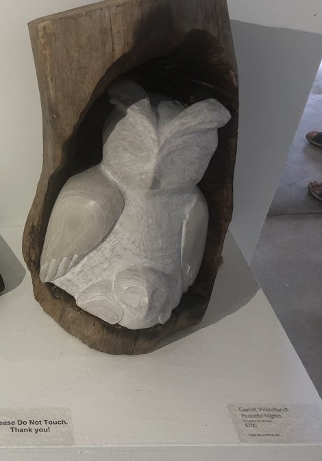Picture of a carved owl family in stone